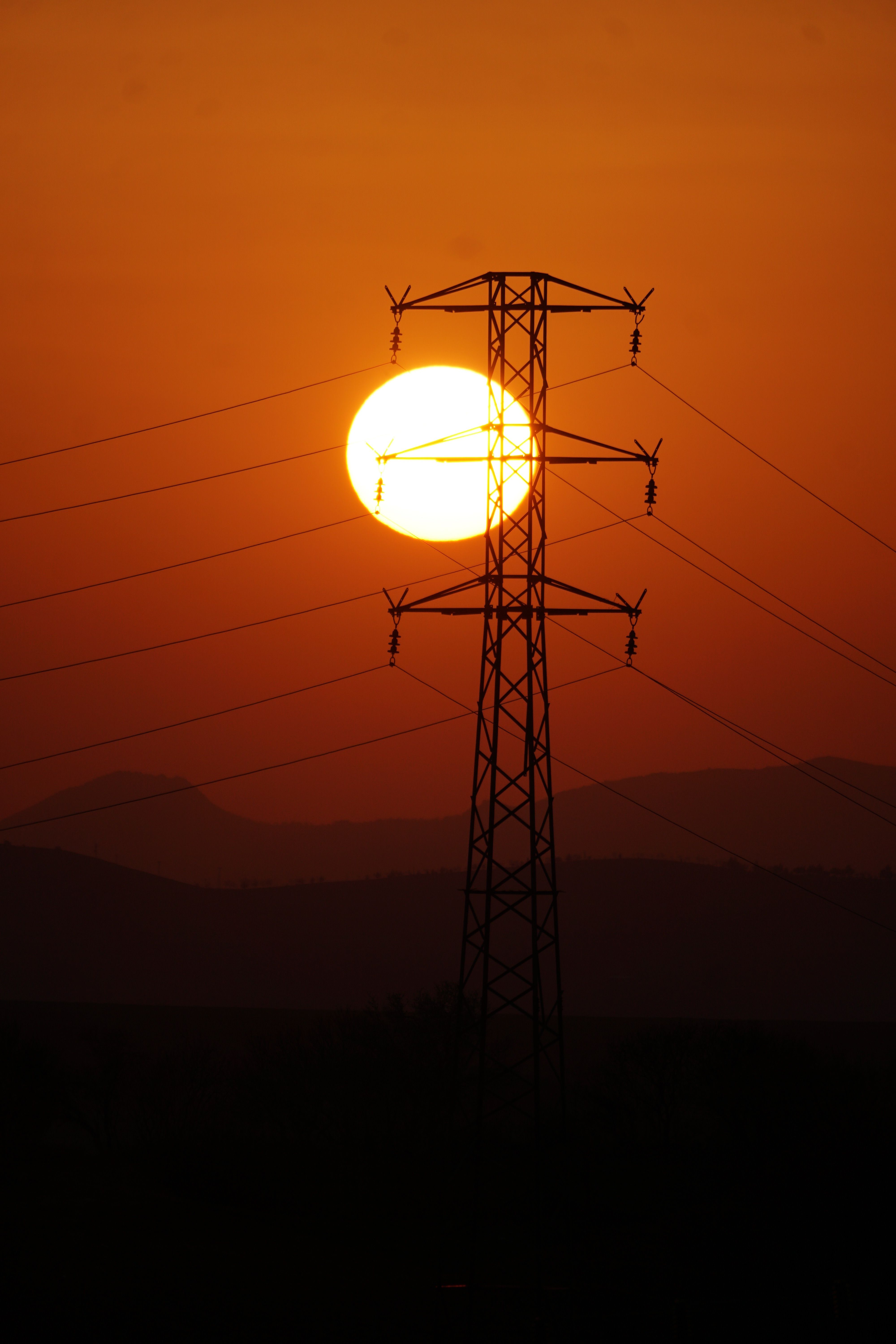 Silhouette of Power Line at Sunset with Orange Sky · Free Stock Photo