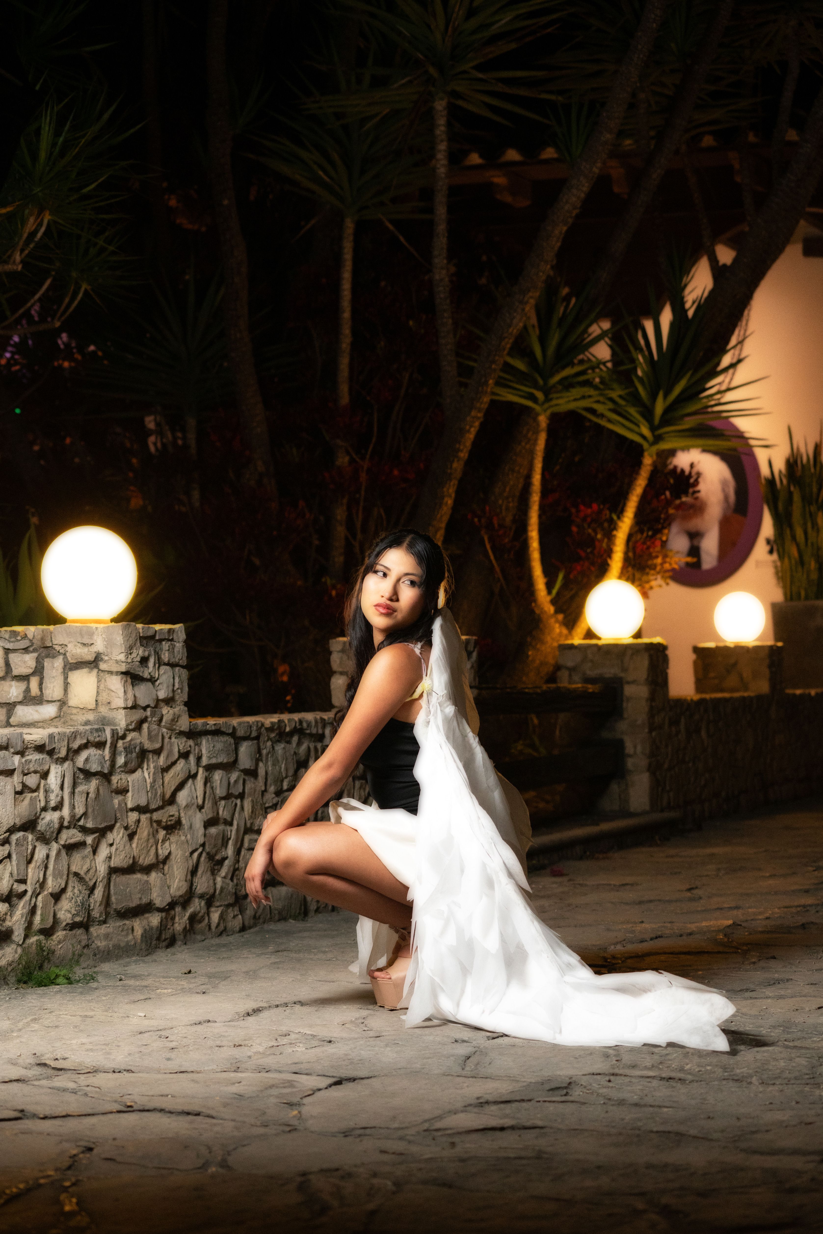 Elegant Woman Posing Outdoors at Night · Free Stock Photo