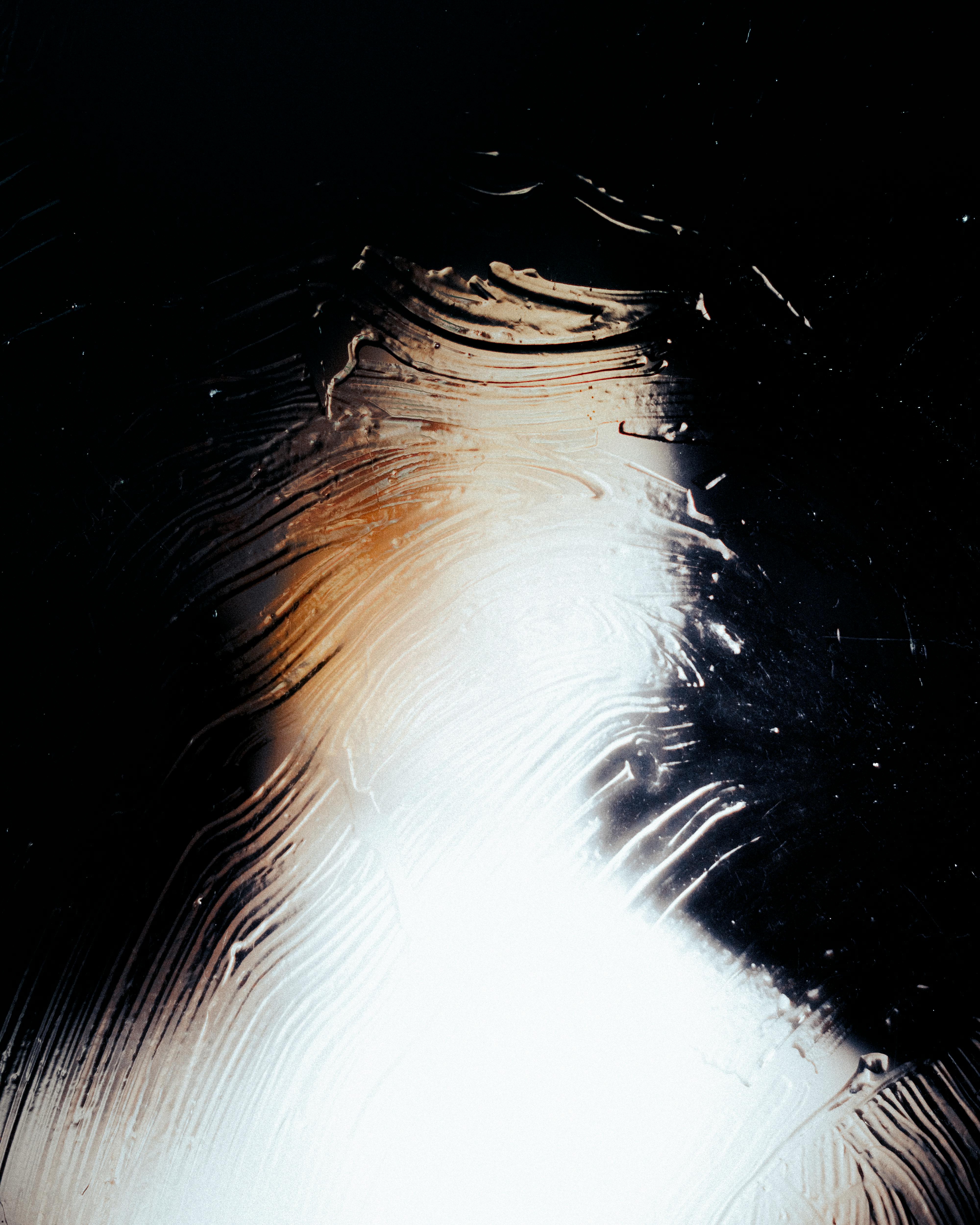 Abstract Light and Shadow on Glass Surface · Free Stock Photo