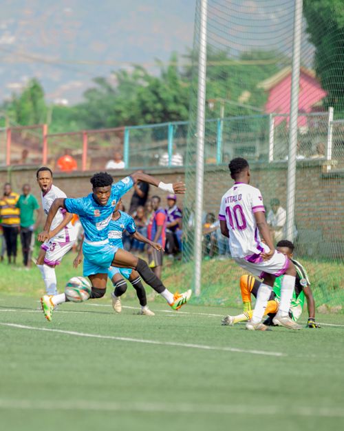 Free Soccer players in an intense match captured mid-action on a sunny day. Stock Photo