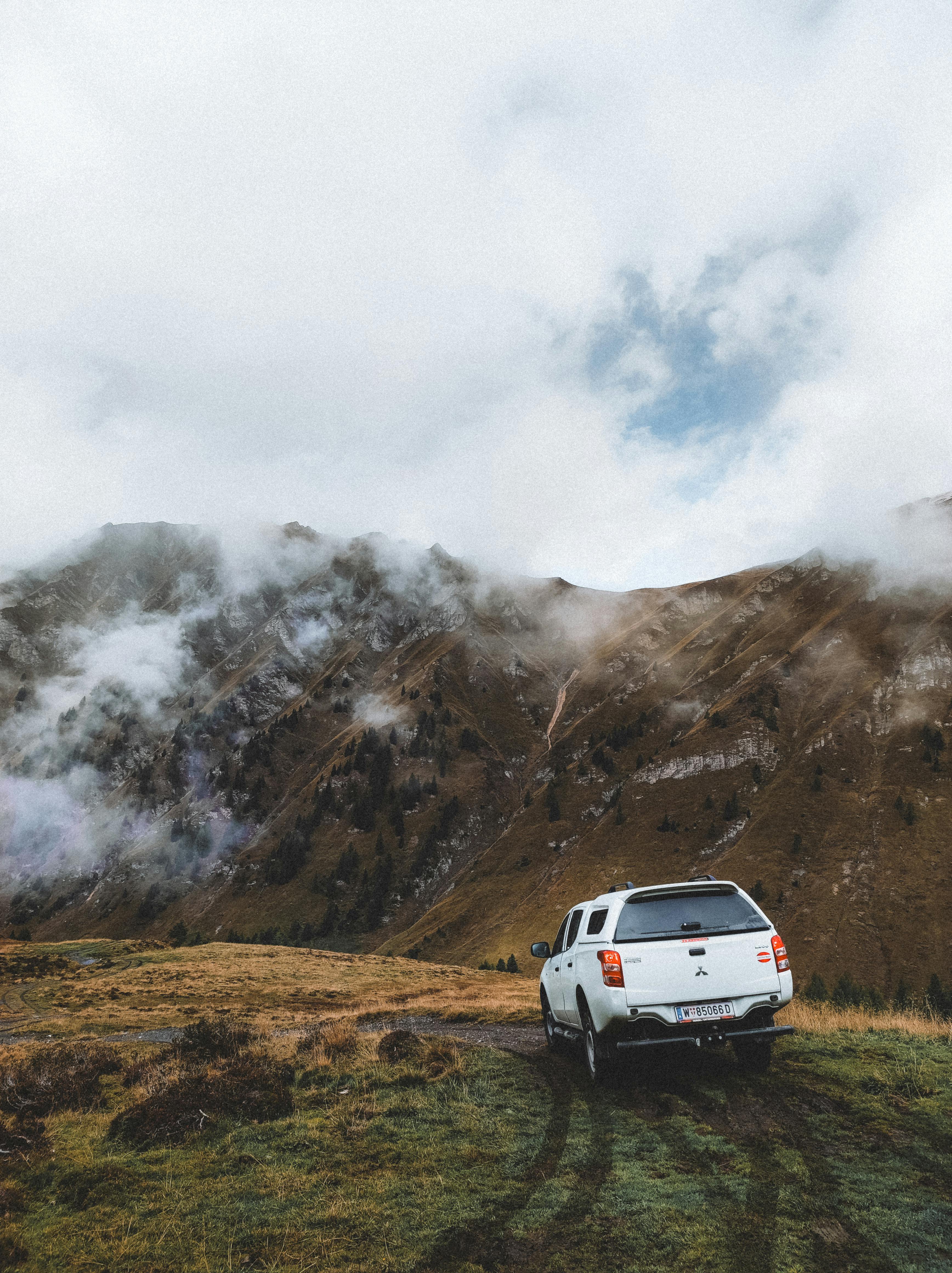 Adventure Drive in the Misty Tyrolean Alps · Free Stock Photo