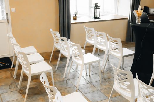 Arrange seating for conversation in a narrow room image
