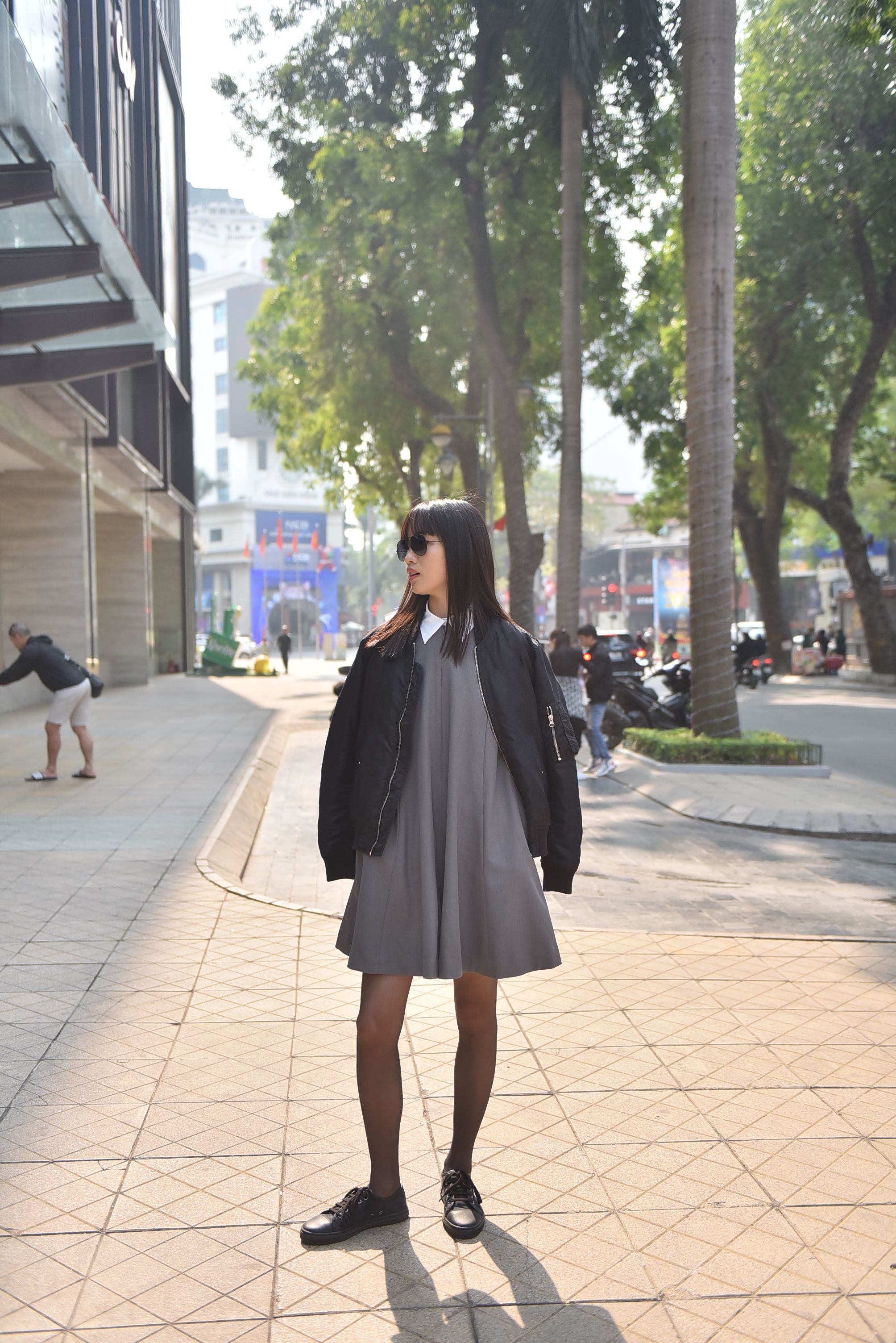 Stylish Woman in Urban Street Setting · Free Stock Photo