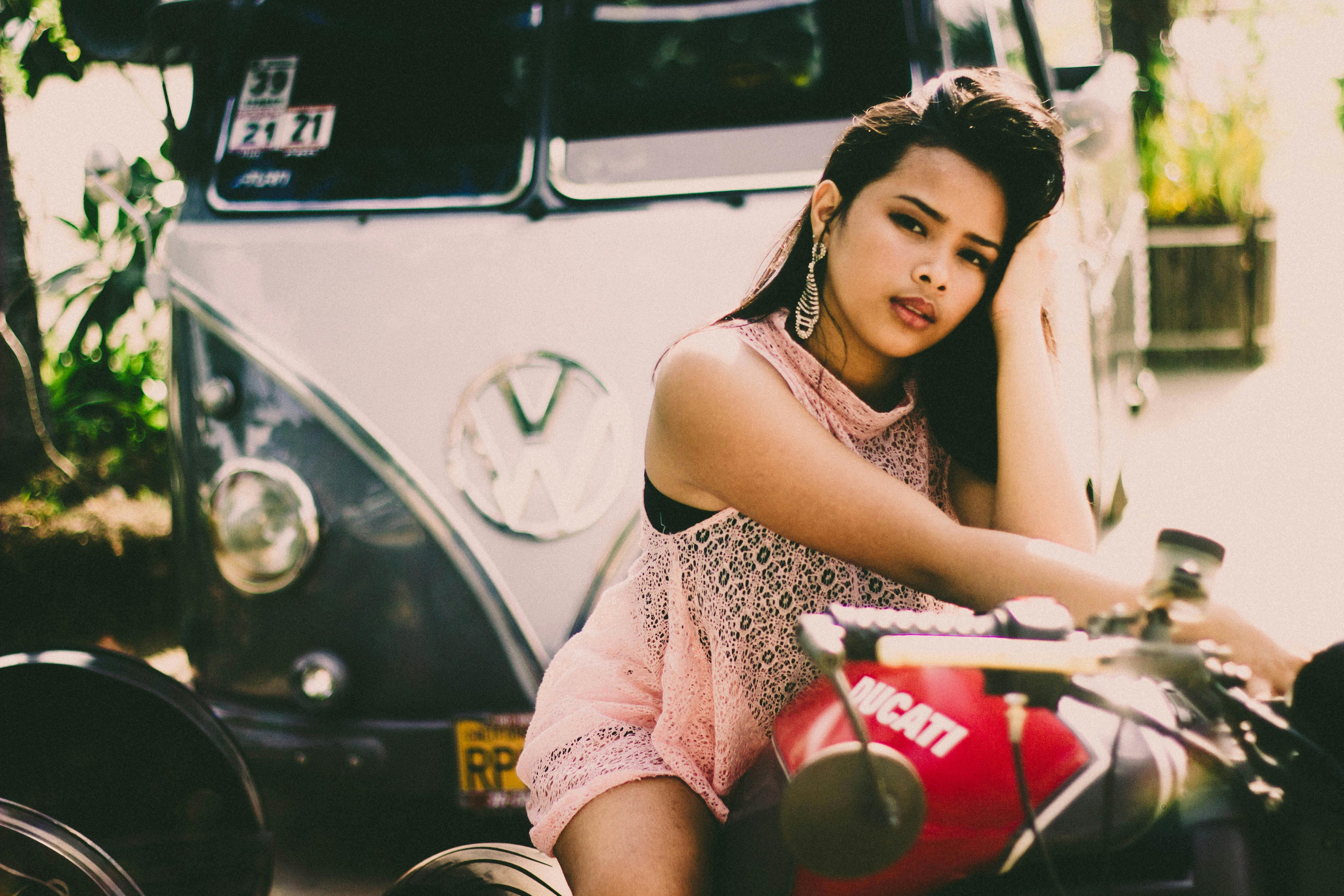 Young Indian girl posing on motorcycle, Pune Stock Photo | Adobe Stock
