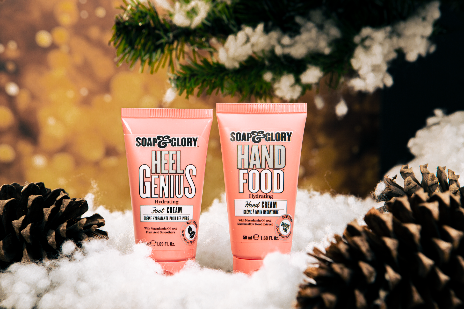 Soap & Glory creams amidst pine cones and snow create a festive look.