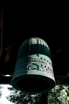 A culturally rich large bronze bell in a Japanese garden in Buenos Aires, Argentina.