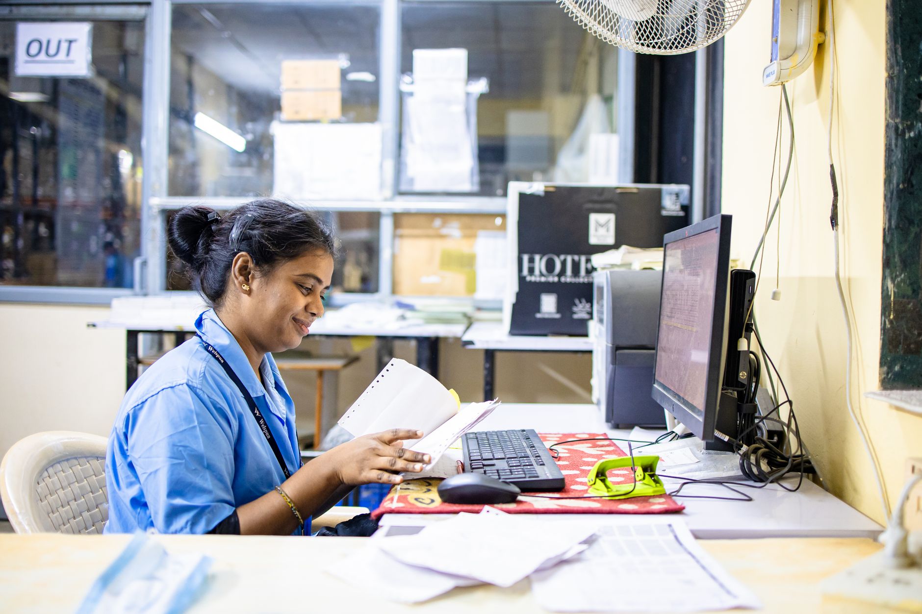 Editorial photo for Can I Sue My Employer for Stress and Anxiety, showing employment records and workplace documents.
