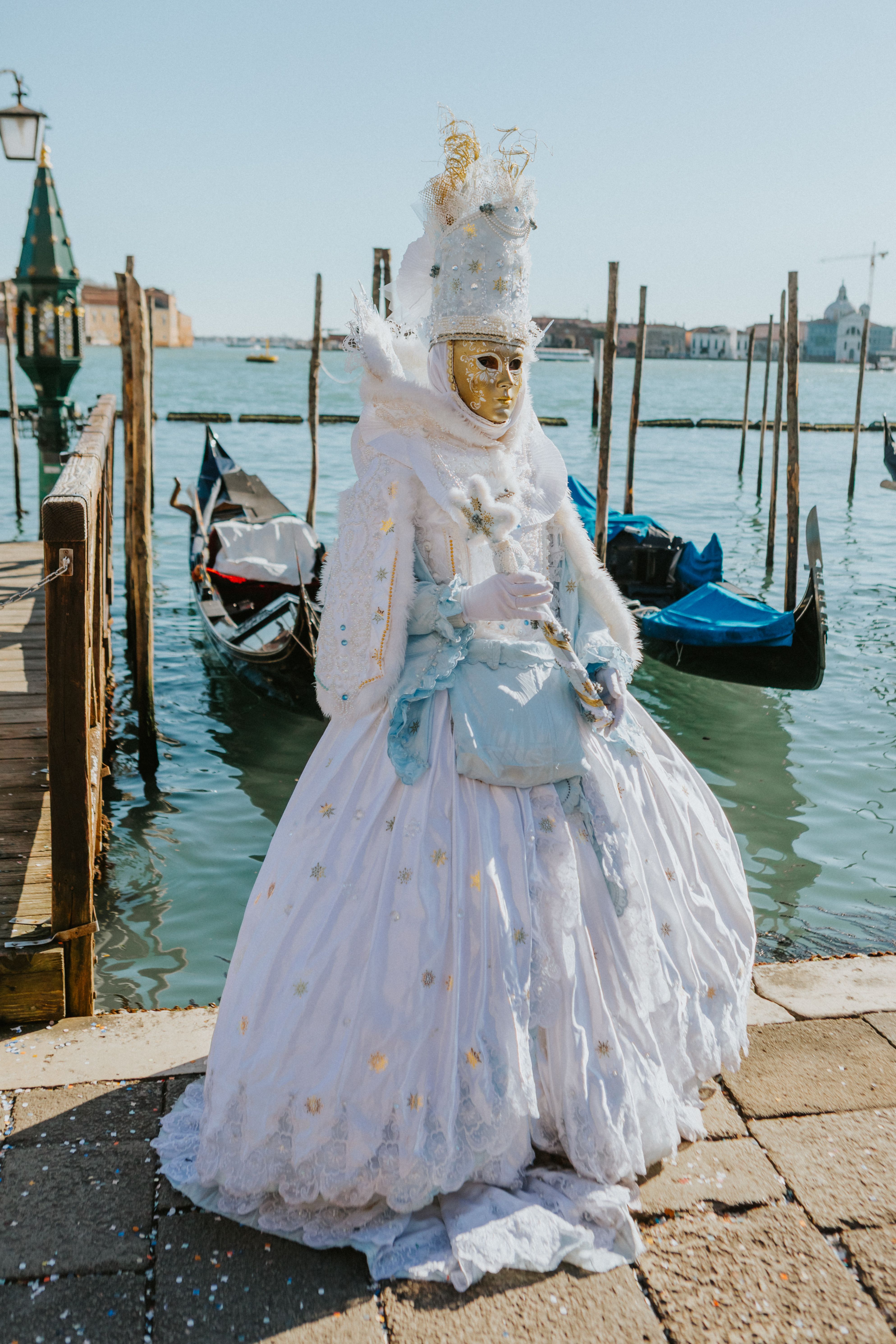 Venetian Carnival Costume by Gondolas · Free Stock Photo