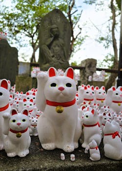 A collection of Maneki Neko statues at Gōtokuji Temple in Setagaya, Tokyo.