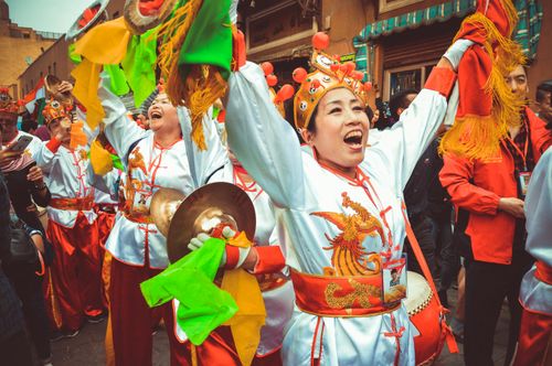 Free Joyous performers in traditional attire at Cairo's colorful drum festival celebration. Stock Photo