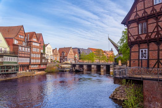 Charming brick buildings and river view in Lüneburg, Germany's picturesque old town.