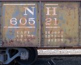 Close-up view of a historic rusty train car at Danbury Railway Museum.