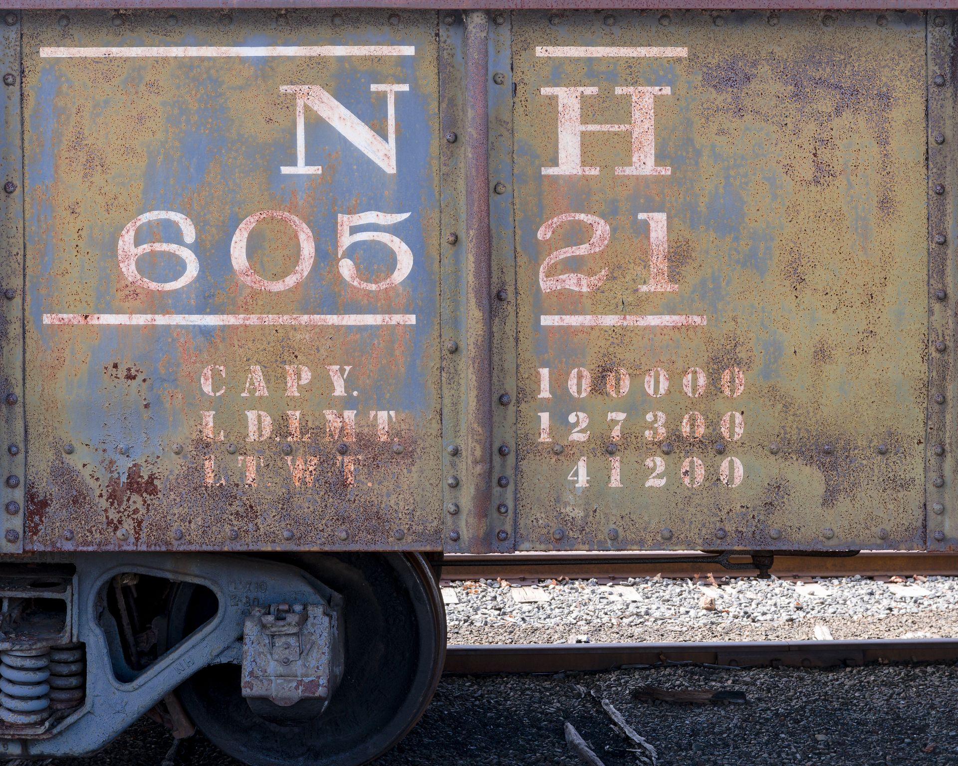 Close-up view of a historic rusty train car at Danbury Railway Museum.