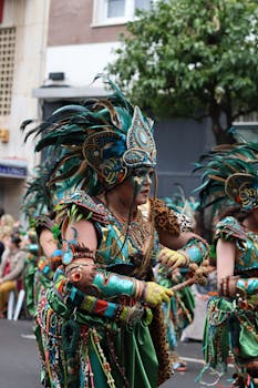 Colorfully costumed performers at Badajoz Carnival, showcasing rich cultural heritage.