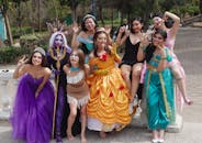 Fun Group of Friends in Colorful Costumes Outdoors