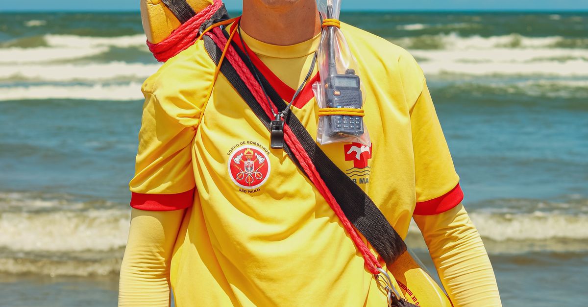 Beach Rescue Lifeguard Beach Lifeguard in Action with Rescue Gear · Free Stock Photo