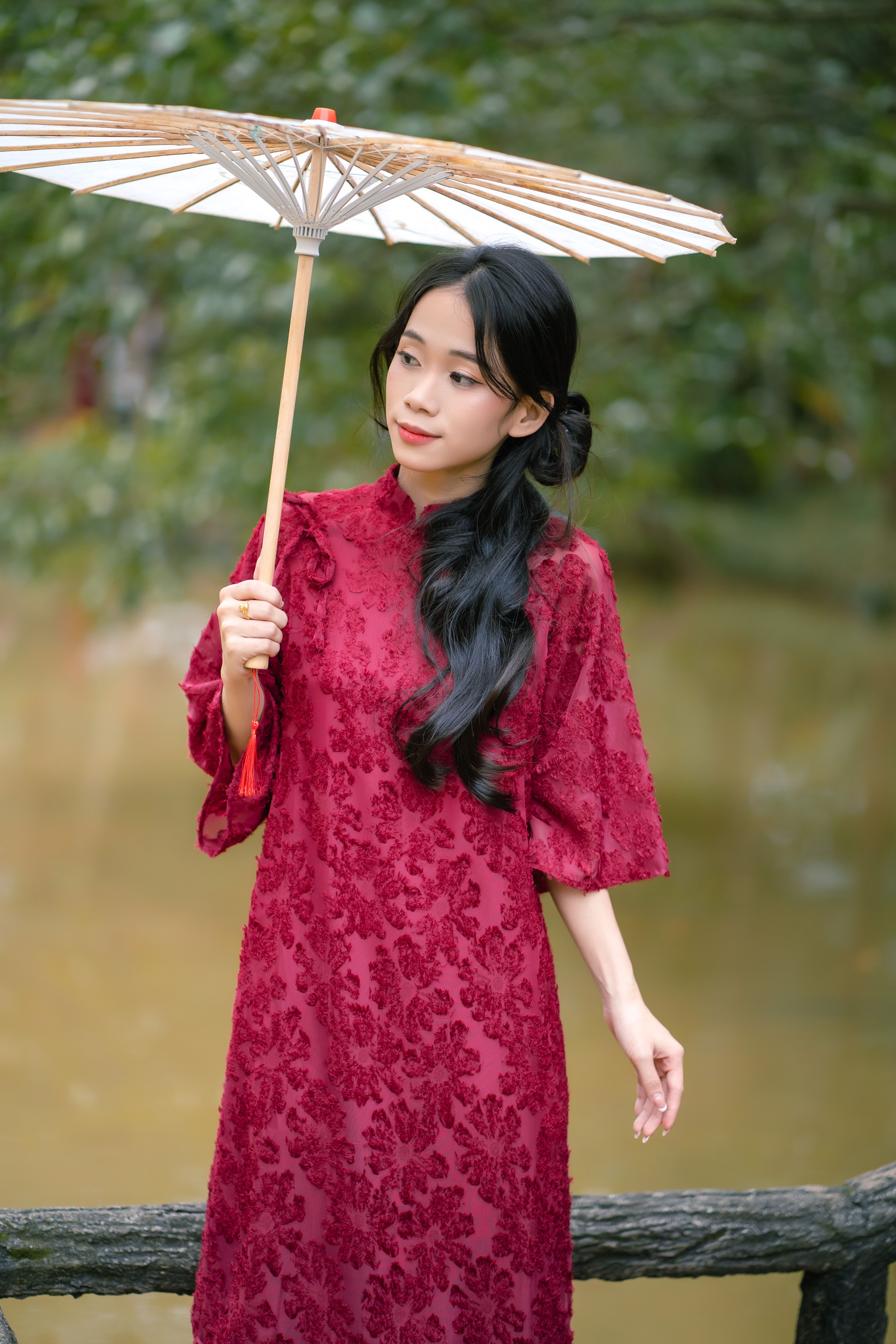 Elegant Woman in Traditional Red Dress with Umbrella · Free Stock Photo