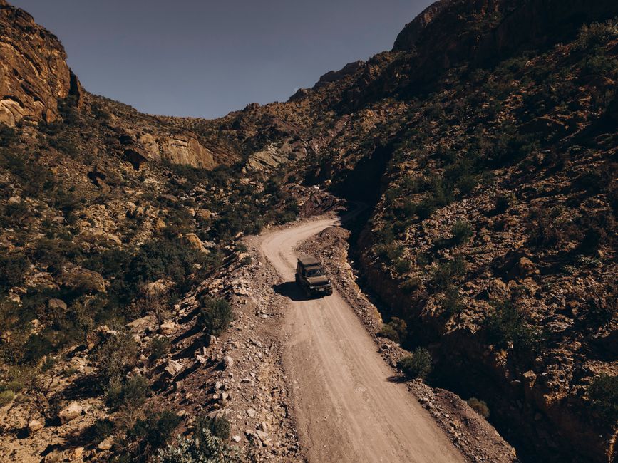 Explore a rugged off-road journey through stunning desert mountain landscapes in Oman.