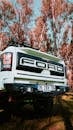 Off-road Ford Truck in Autumn Forest Setting