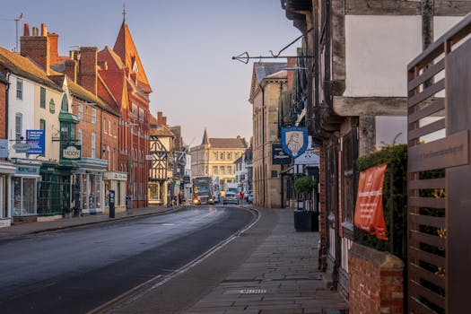 Picturesque street scene in Stratford-upon-Avon, England showcasing charming architecture at dusk.