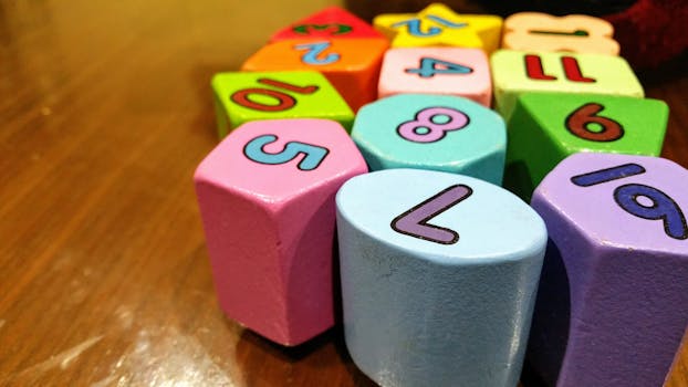 Close-up of colorful wooden blocks with numbers for educational fun.