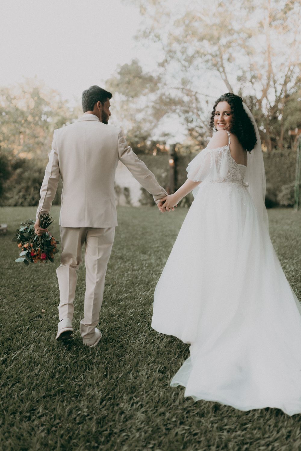 Romantic Outdoor Wedding Couple Holding Hands · Free Stock Photo