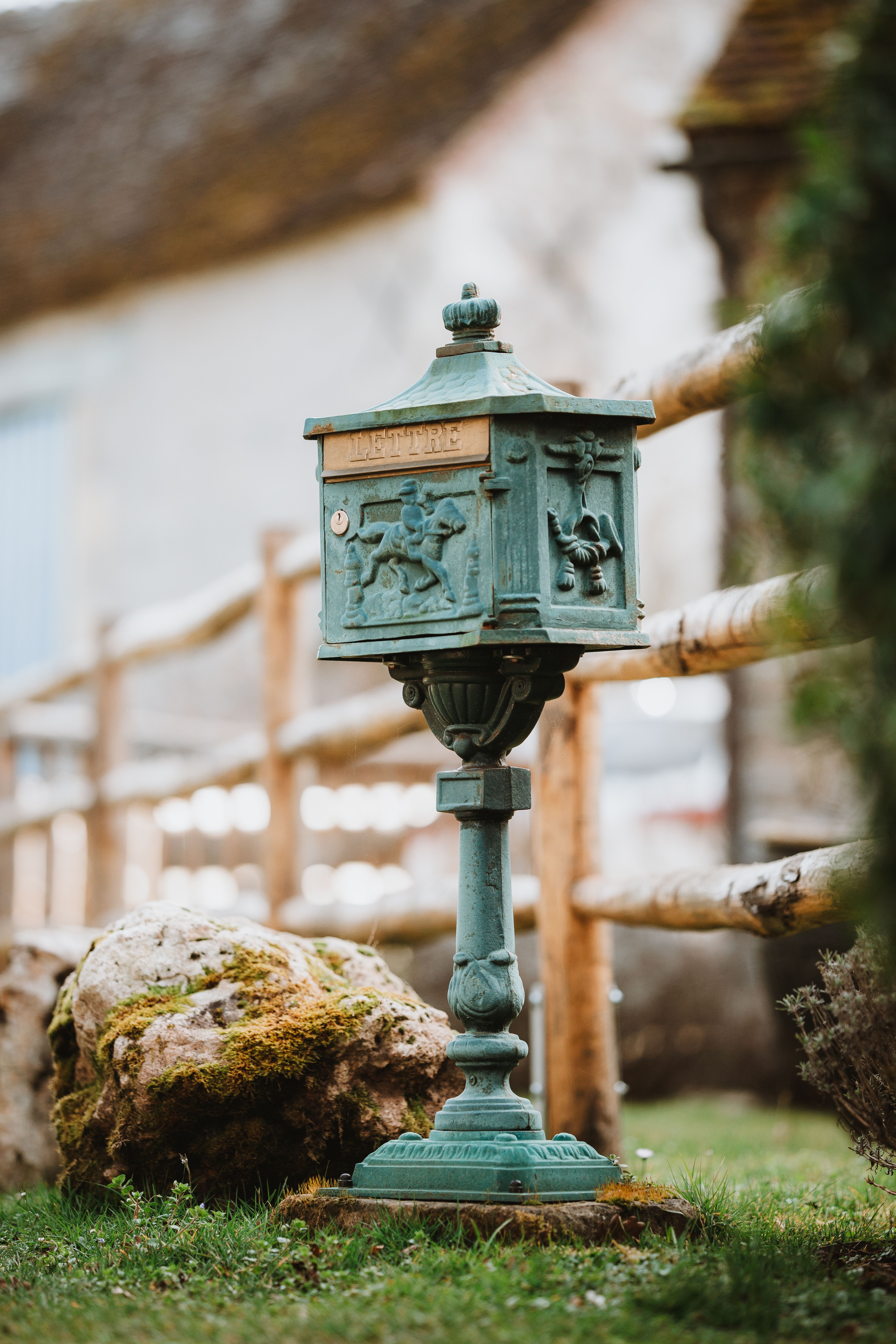 Vintage Green Metal Mailbox in Rustic Setting · Free Stock Photo