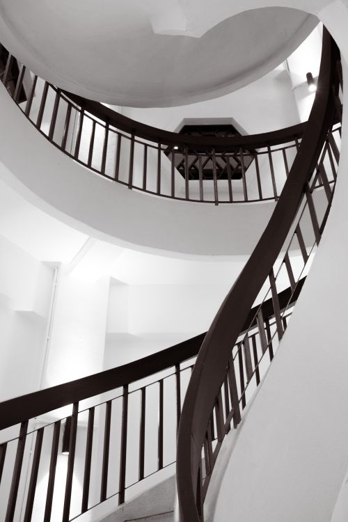 Free Elegant spiral staircase in modern architecture with abstract design. Stock Photo
