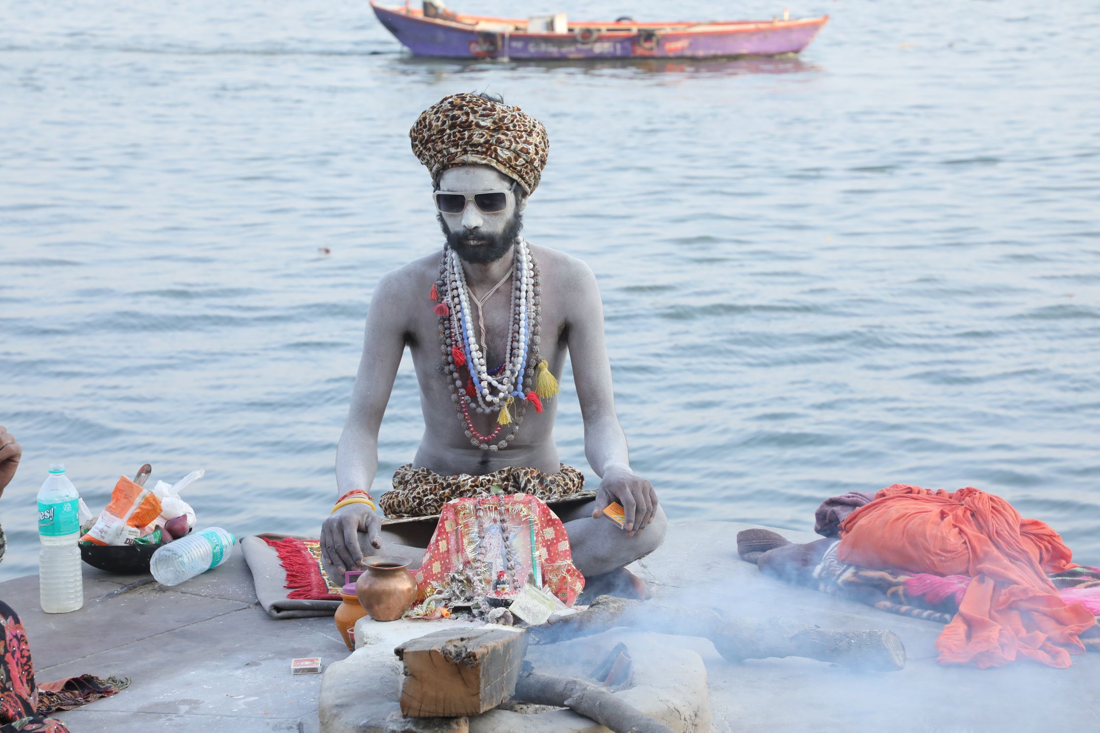 Sadhu Performing Ritual on Ganga Ghat in Varanasi · Free Stock Photo