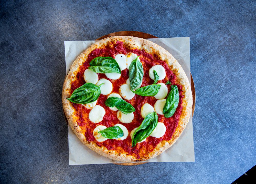 Classic Margherita pizza with tomato, mozzarella and basil