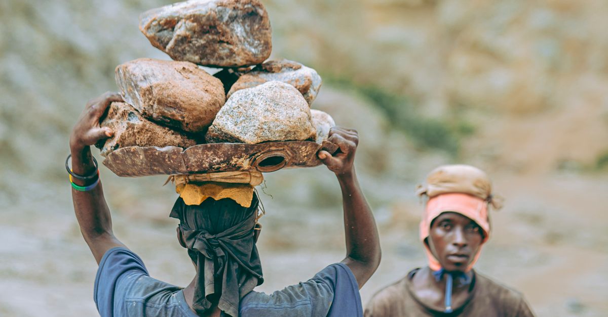 Workers Carrying Rocks Manual Laborers Carrying Stones in Quarry · Free Stock Photo