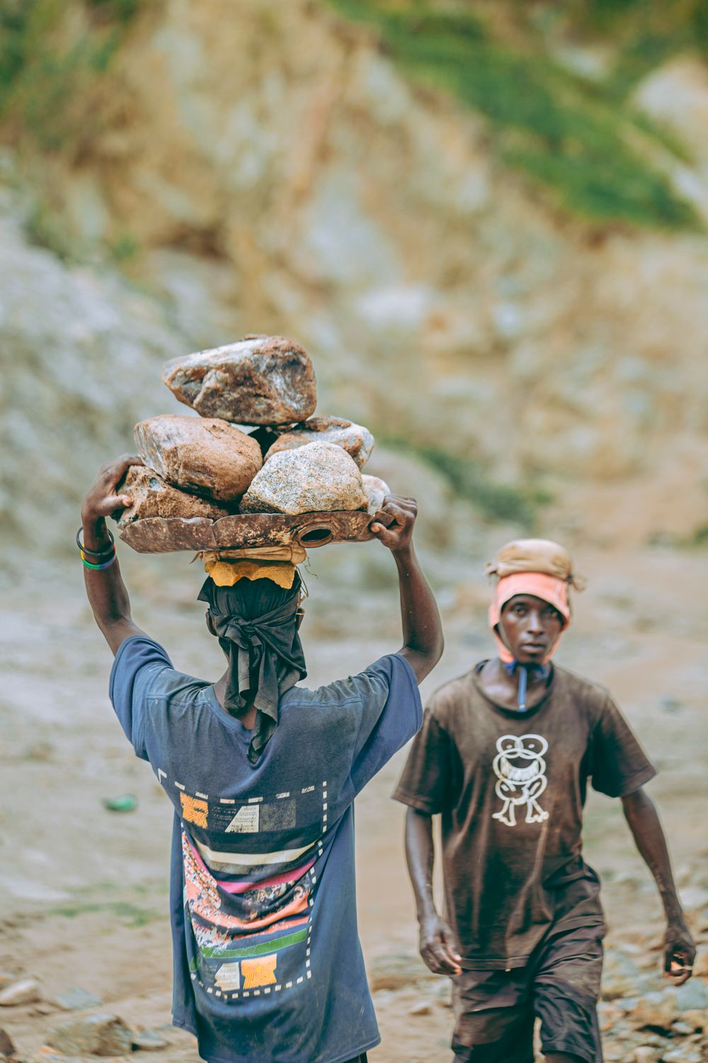Workers Carrying Rocks Manual Laborers Carrying Stones in Quarry · Free Stock Photo