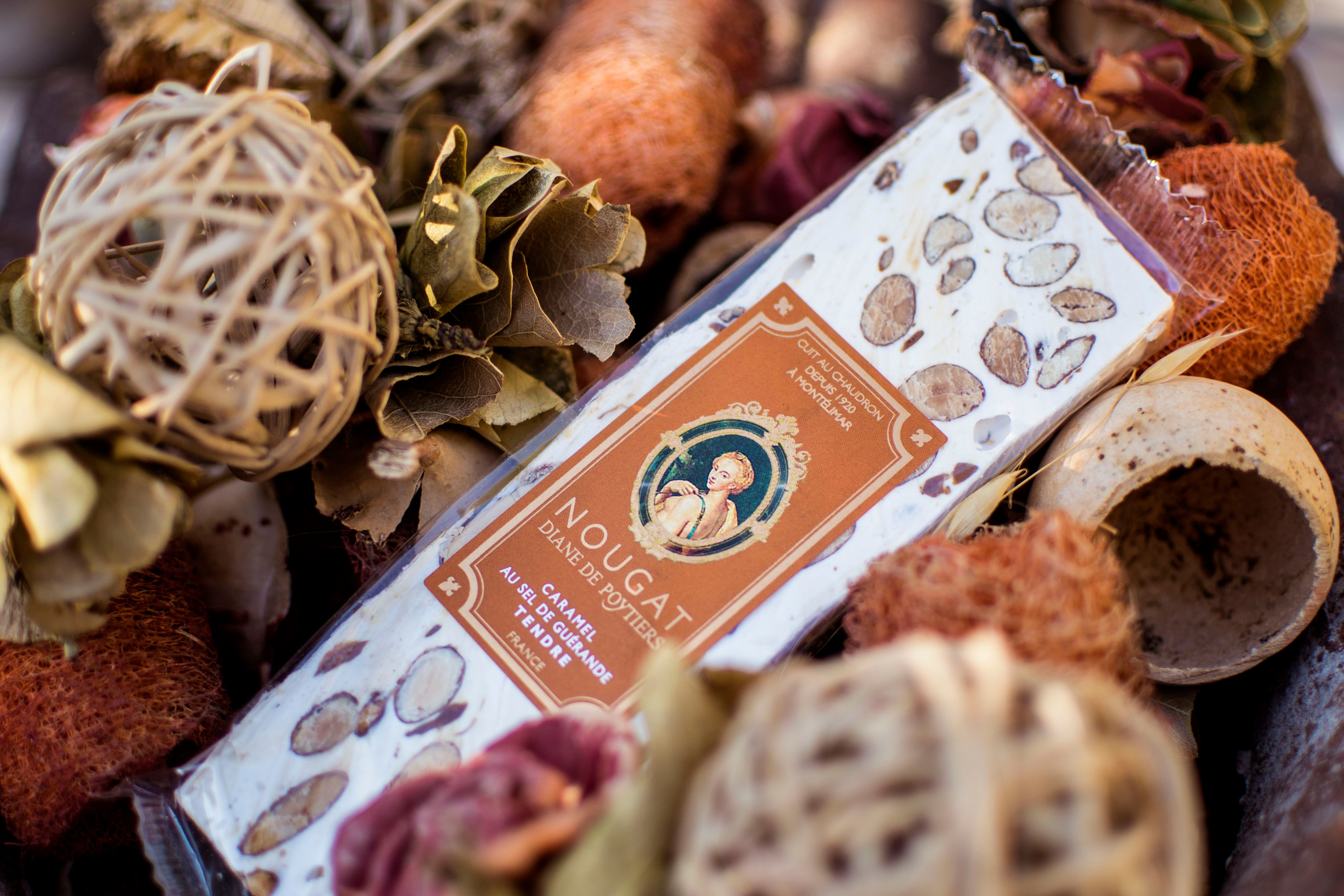 Classic French nougat bar from Montélimar showcased in an artistic rustic arrangement.