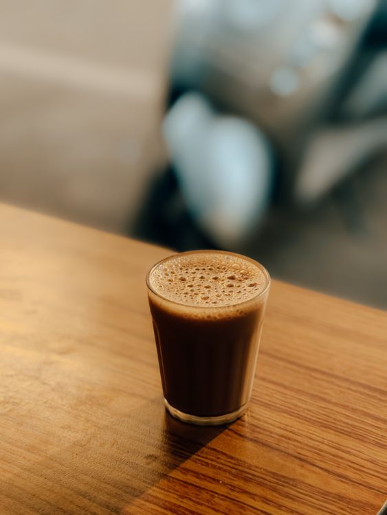 Chai Table Display Classic Indian Chai on Wooden Table · Free Stock Photo