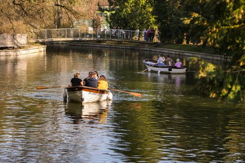 Free Two boats with people enjoying a serene ride on a river in a park in Zagreb, Croatia. Stock Photo