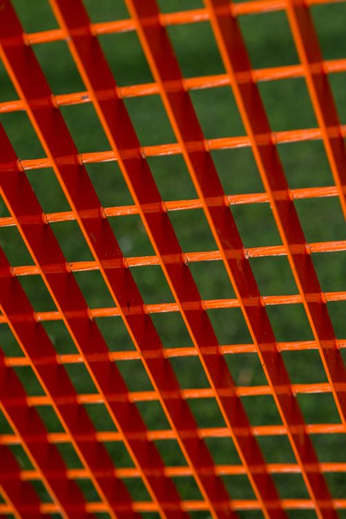 Abstract Orange Grid on Green Background · Free Stock Photo