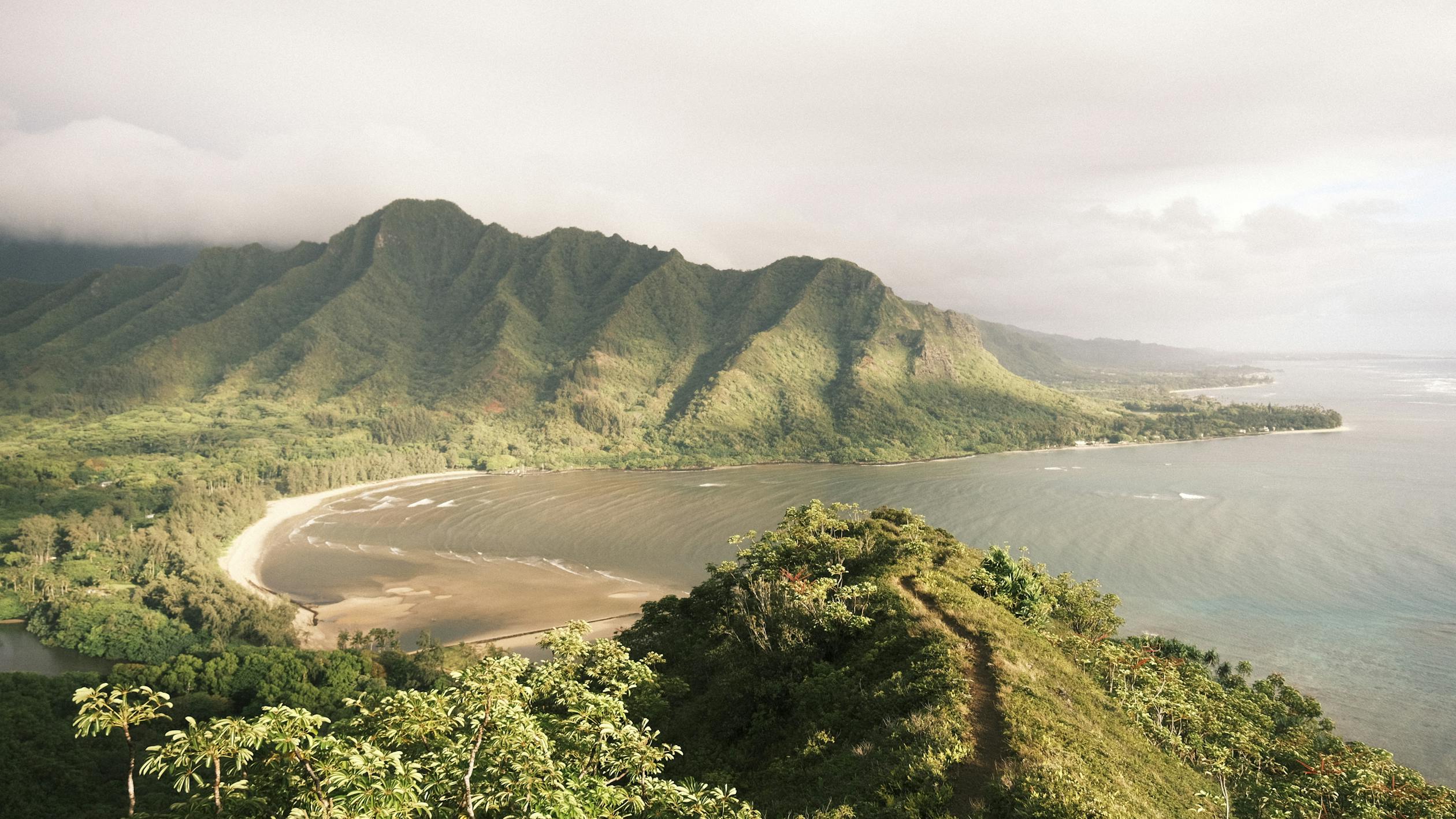 free photo of scenic coastal mountain view in tropical region