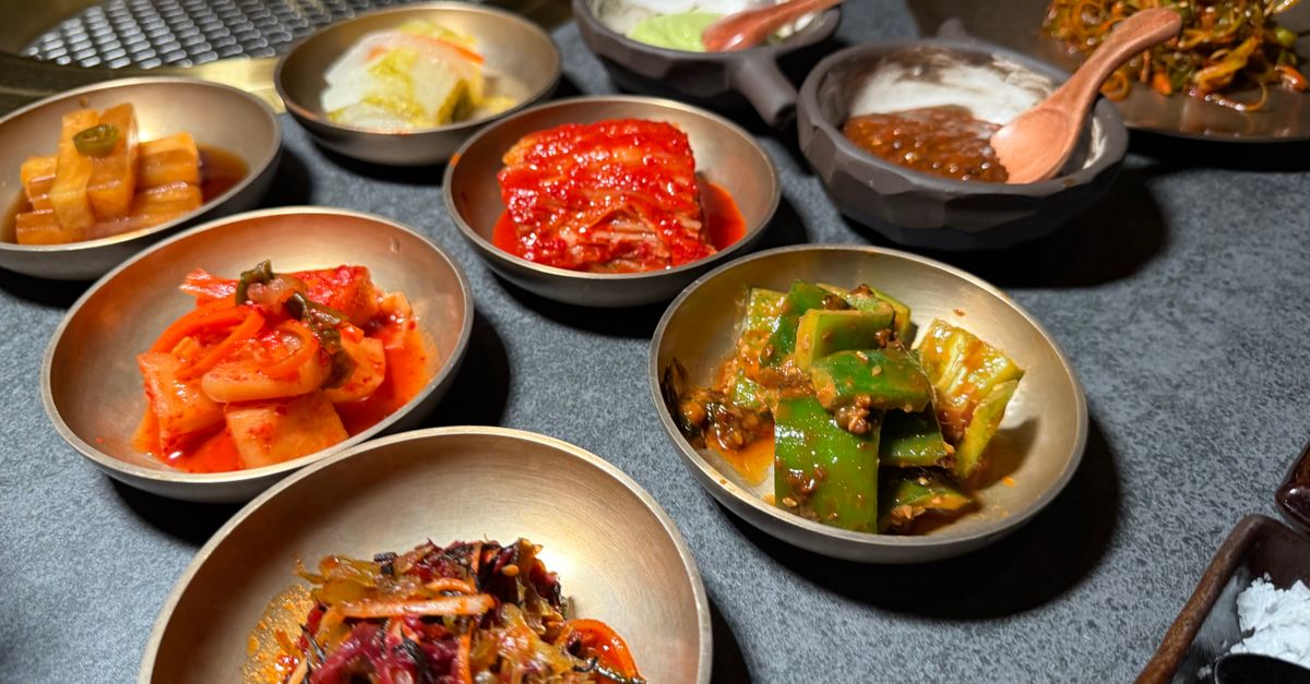 colorful array of fermented foods like kimchi, sauerkraut, and kombucha