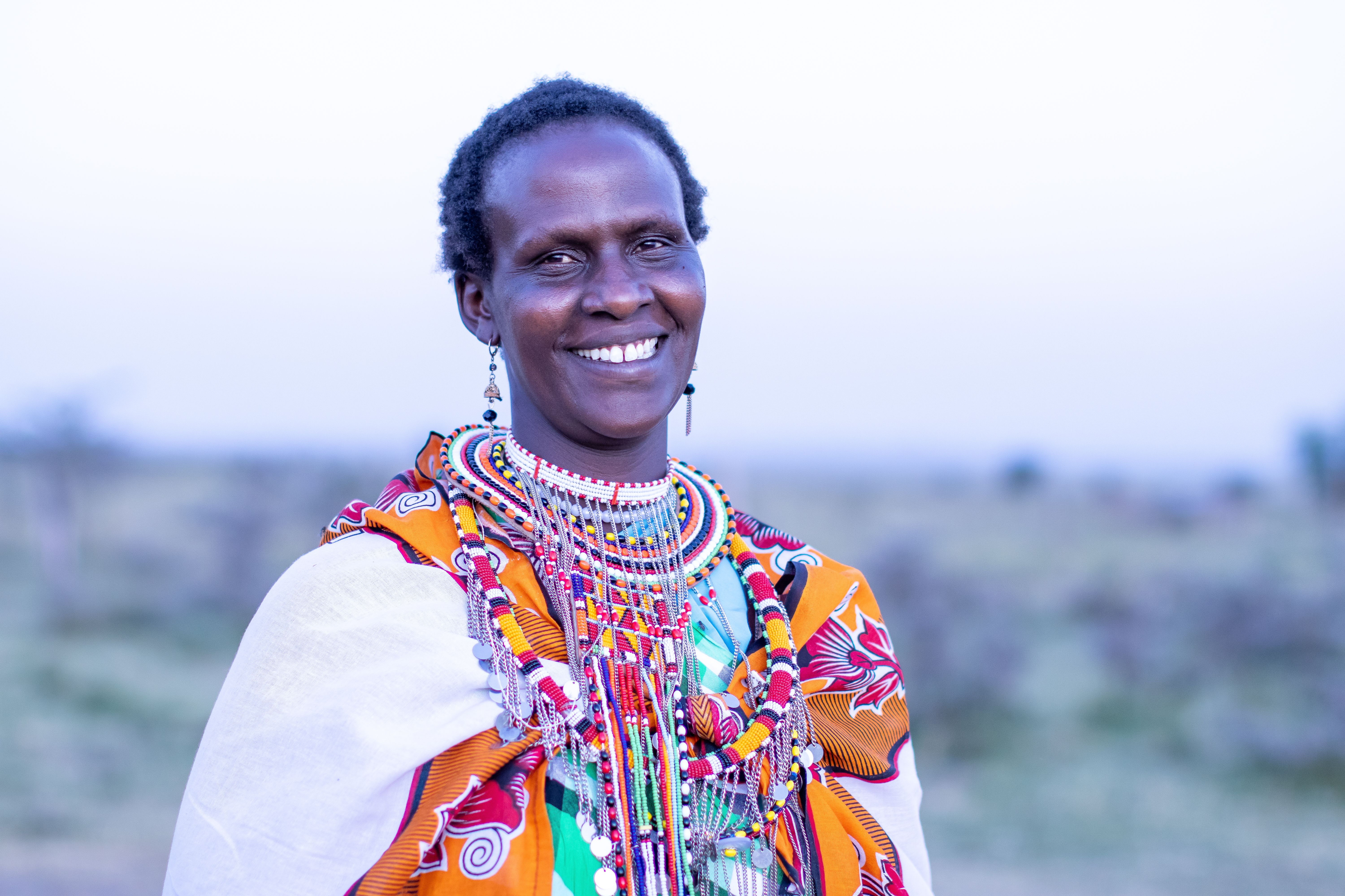 Photo of Two Happy Women in Traditional Masai Clothing  Free Stock Photo