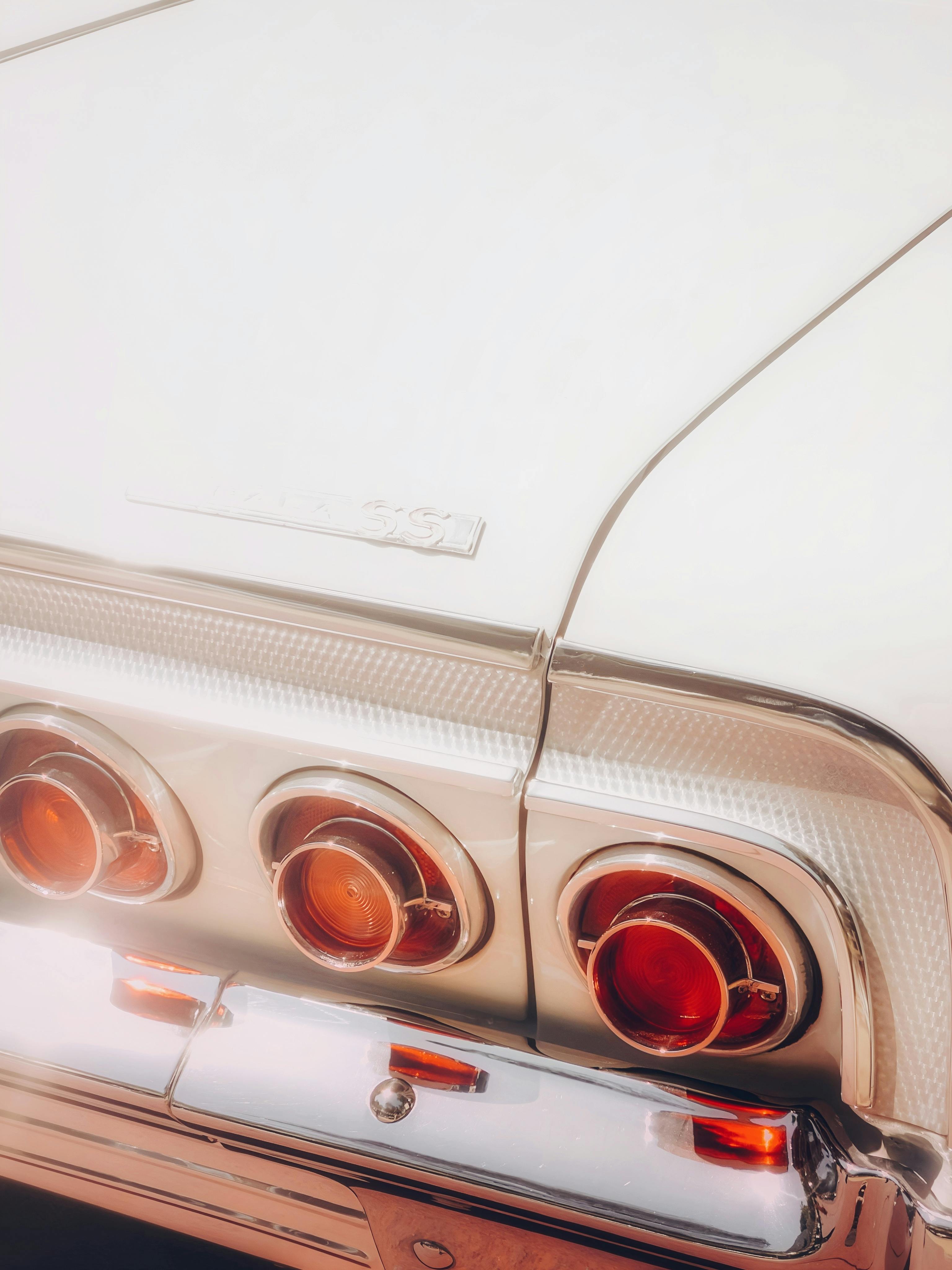 Close-up of a classic car tail light with a vintage aesthetic, shot in Brazil.