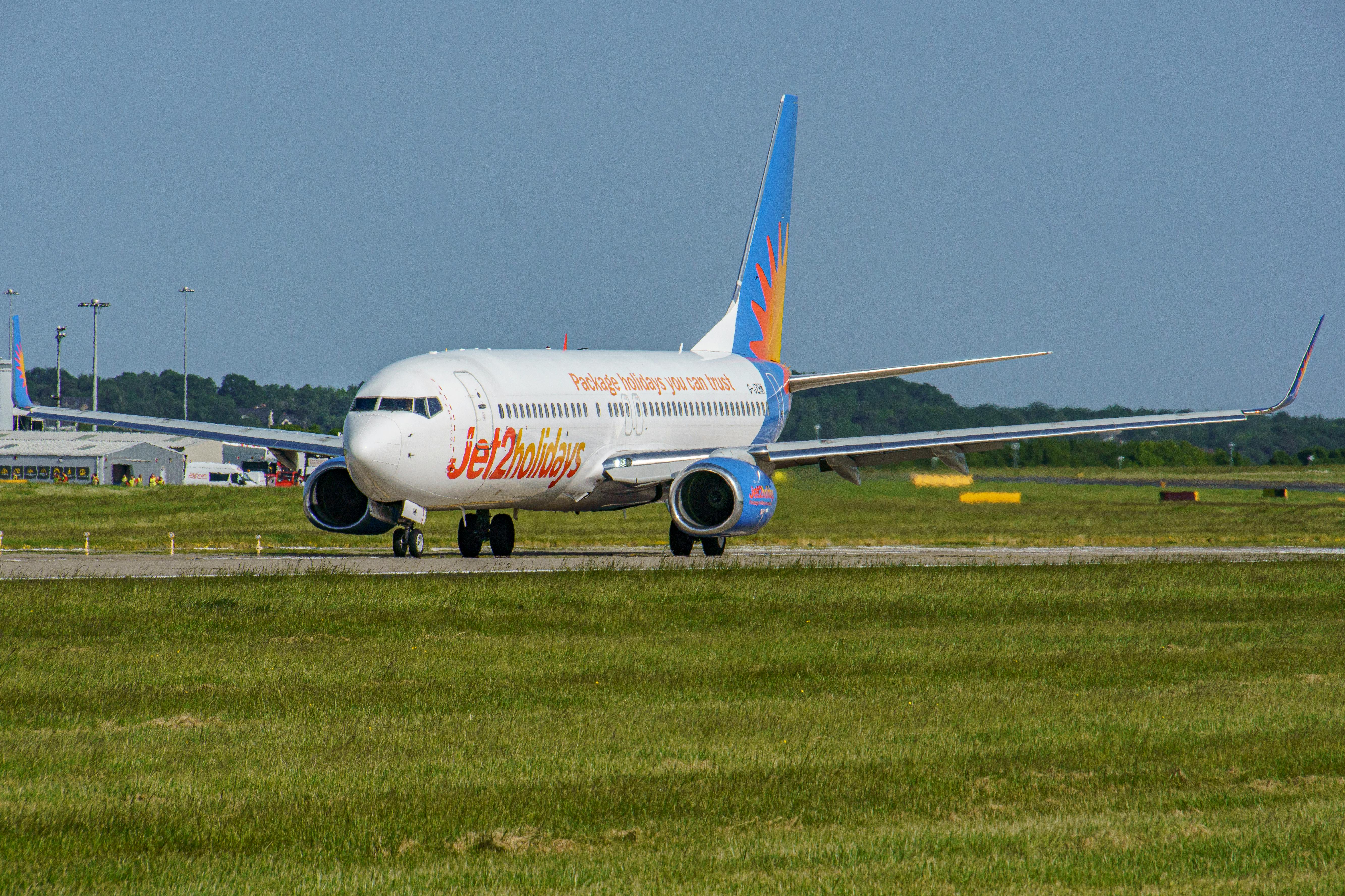 Jet2Holiday aircraft on runway at Leeds Bradford Airport, UK.