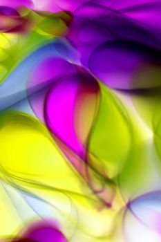 Dynamic abstract art featuring vibrant colors and fluid wave patterns.