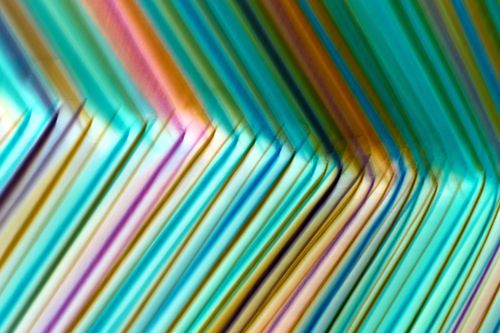Free Colorful abstract pattern featuring dynamic lines and vibrant hues, ideal for modern art lovers. Stock Photo