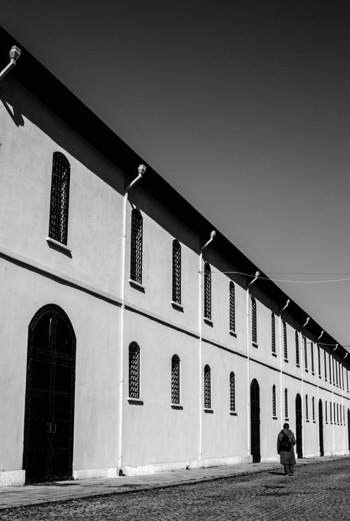 Free Dramatic black and white photo of a street in Istanbul featuring a solitary figure. Stock Photo