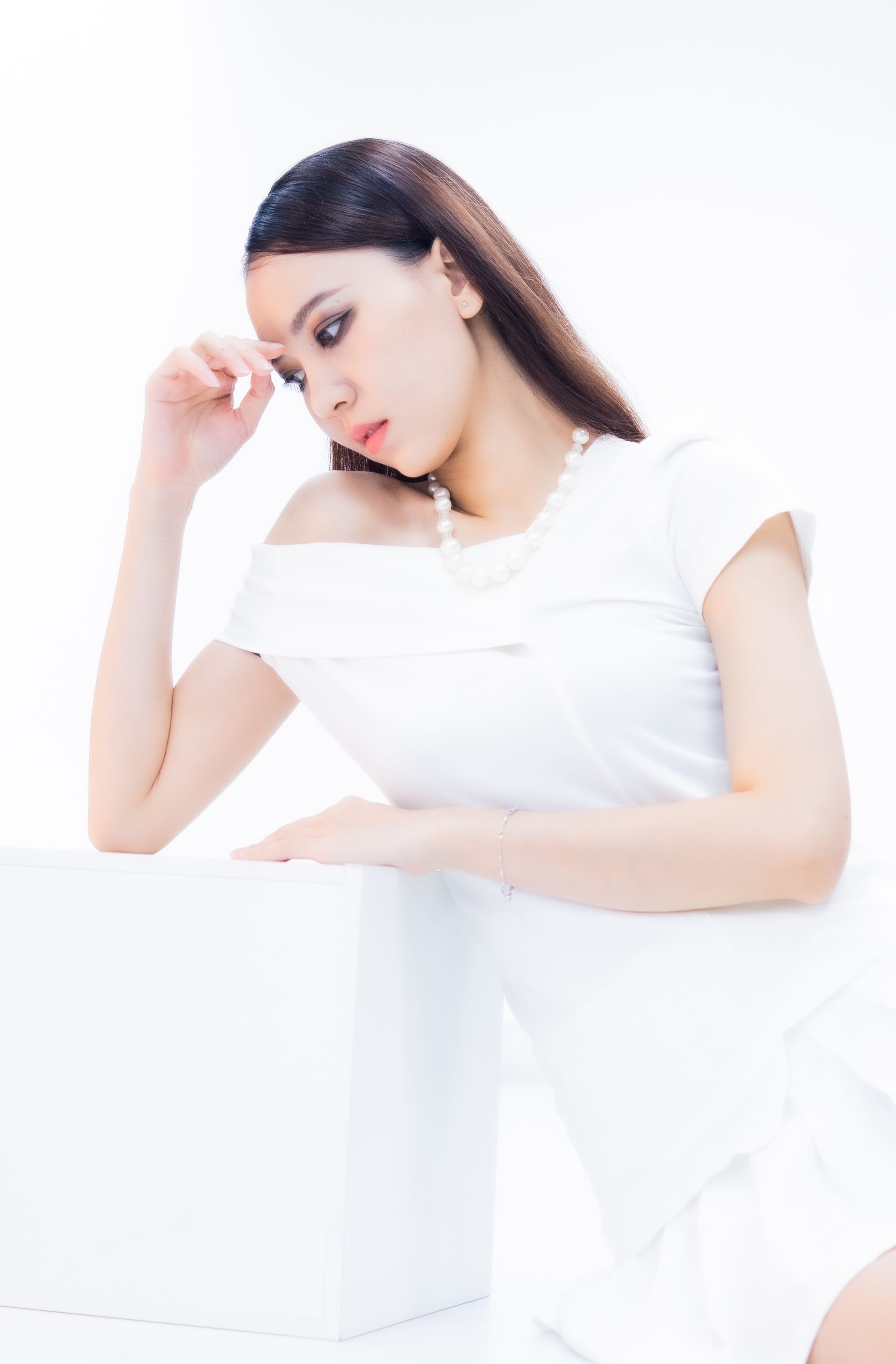 Elegant Woman in White Dress Portrait · Free Stock Photo