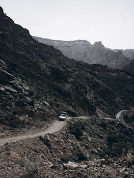 Explore the rugged mountain terrain of Oman with an off-road journey through Snake Canyon.
