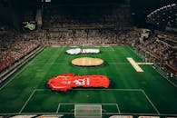 Aerial View of Vibrant Football Match in Abu Dhabi Stadium