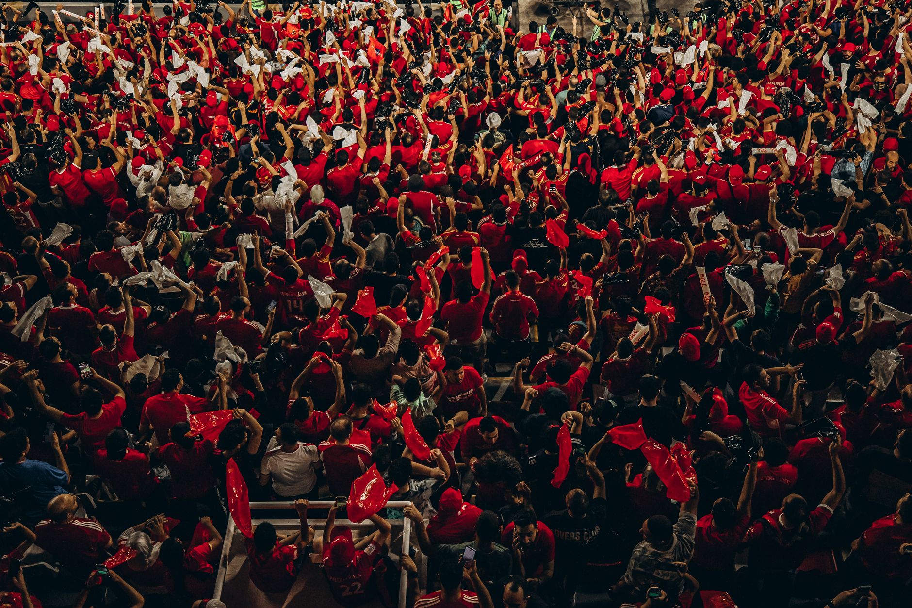 Fans from different countries celebrating beside the LA Memorial Coliseum during a colorful football festival