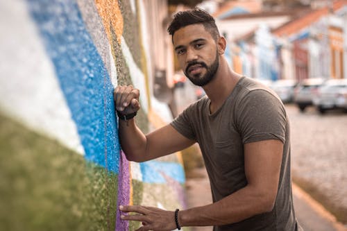 Man Leaning on Wall