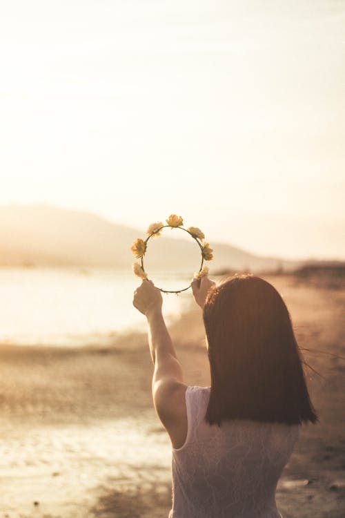 Free Woman Holding a Flower Crown Stock Photo